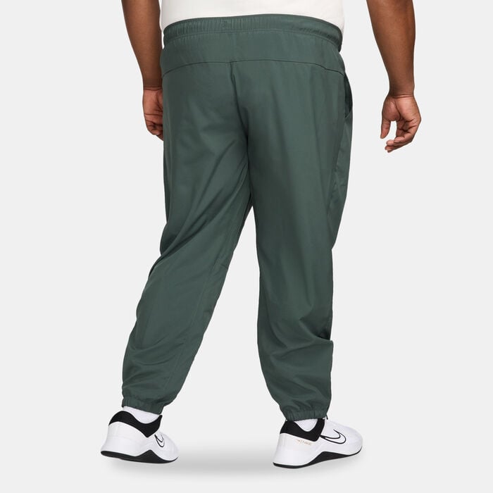 Nike Men's Dri-FIT Tapered Pants Green Nike Men's Dri-FIT Tapered Pants Green image number 1