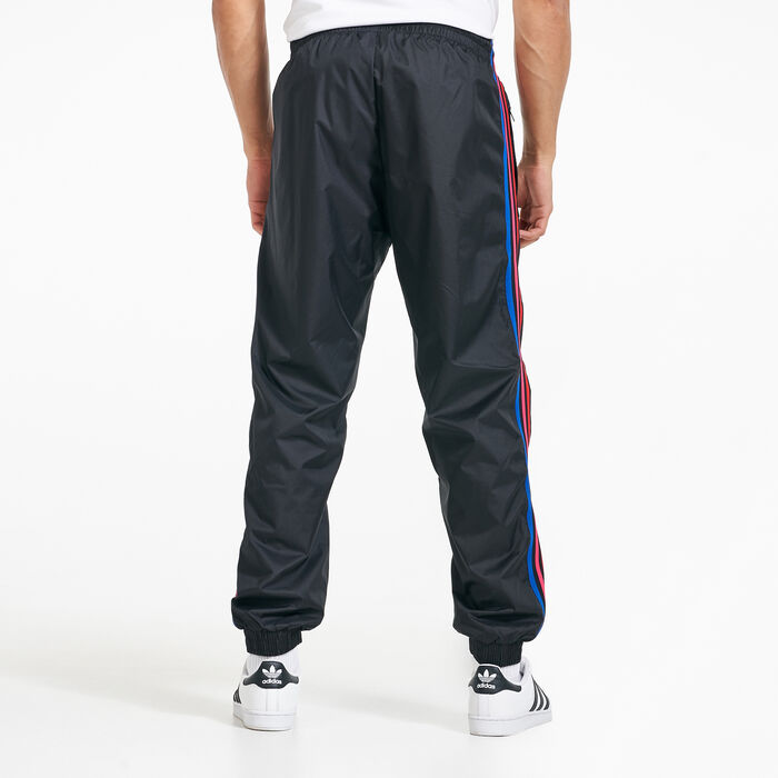 Buy adidas Originals Men's Adicolor 3D Trefoil 3-Stripes Track Pants in Saudi Arabia | SSS