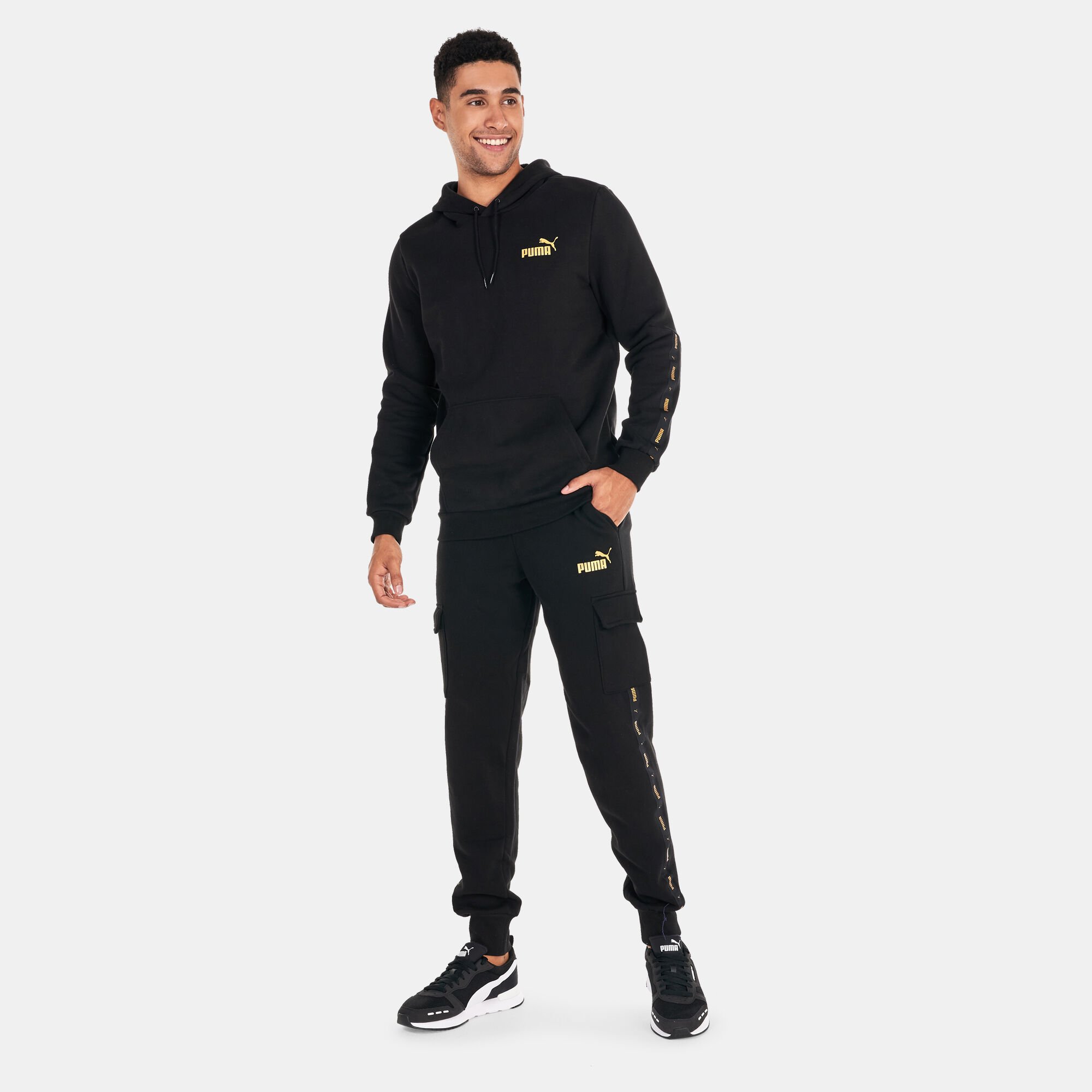 Black and gold puma sweatsuit 2025