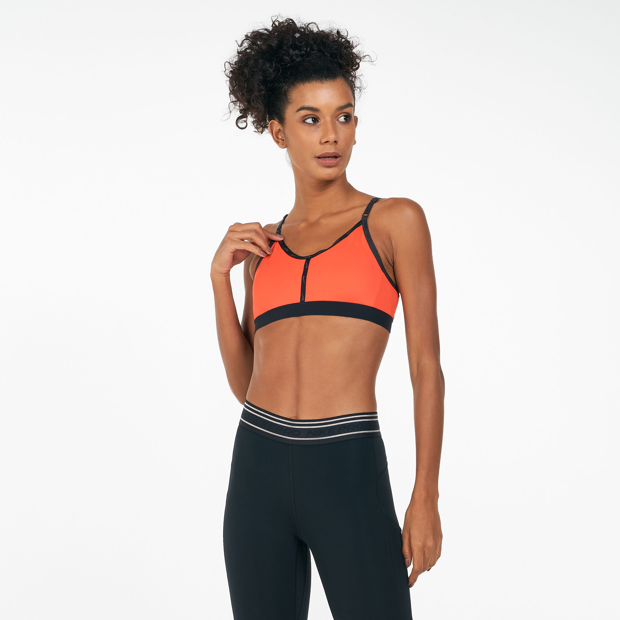 Buy Nike Women s Dri FIT Indy Logo Tape Sports Bra Red in KSA SSS