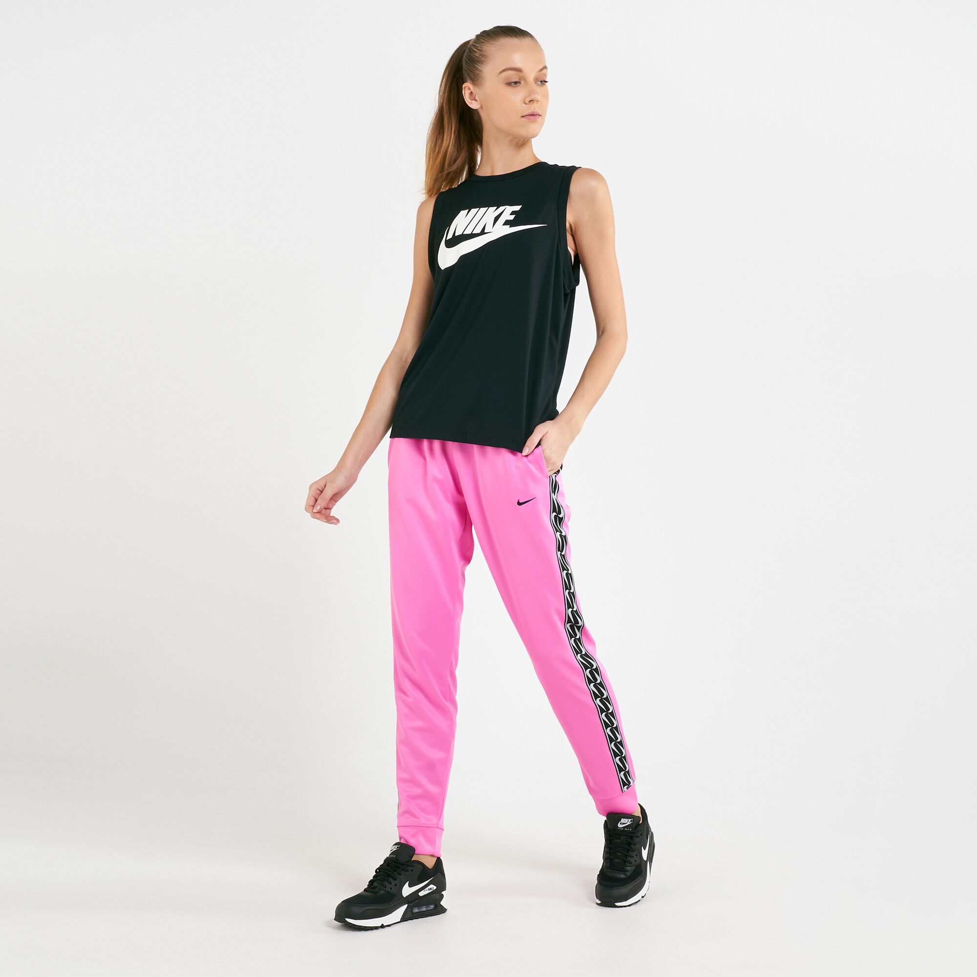 Nike logo tape hotsell jogging pants ladies