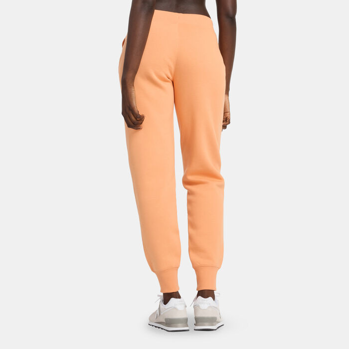 New Balance Women's Classic Core Fleece Pants Orange New Balance Women's Classic Core Fleece Pants Orange image number 1