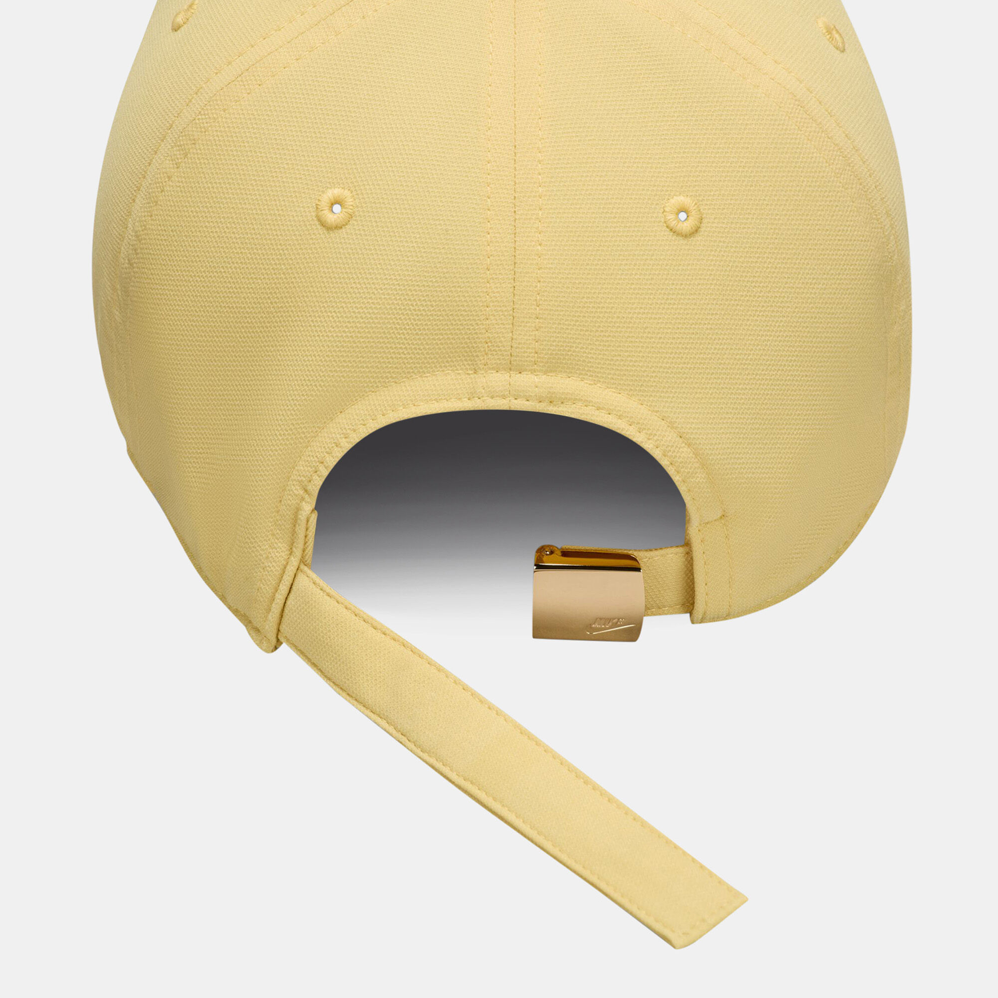 Shop Nike Dri-FIT Club Structured Metal Logo Cap yellow