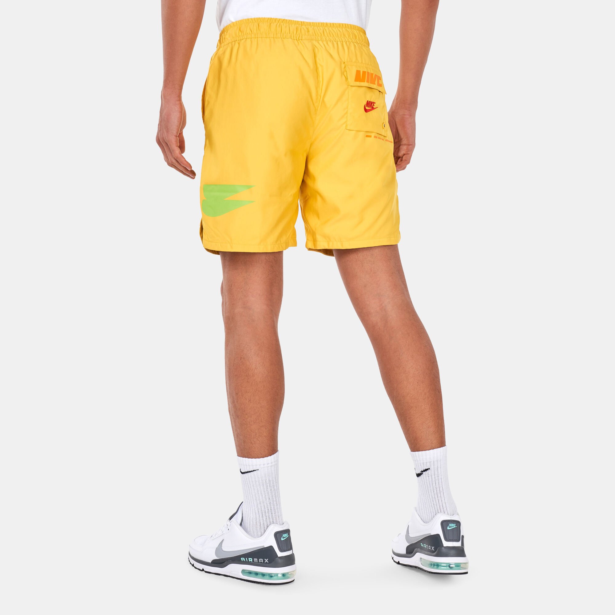 Buy Nike Men s Sportswear Sport Essentials Woven Shorts yellow in