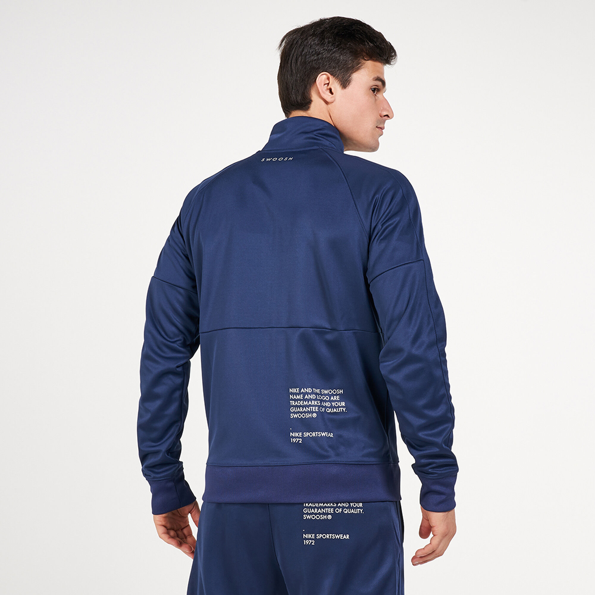 Nike track top sale shop