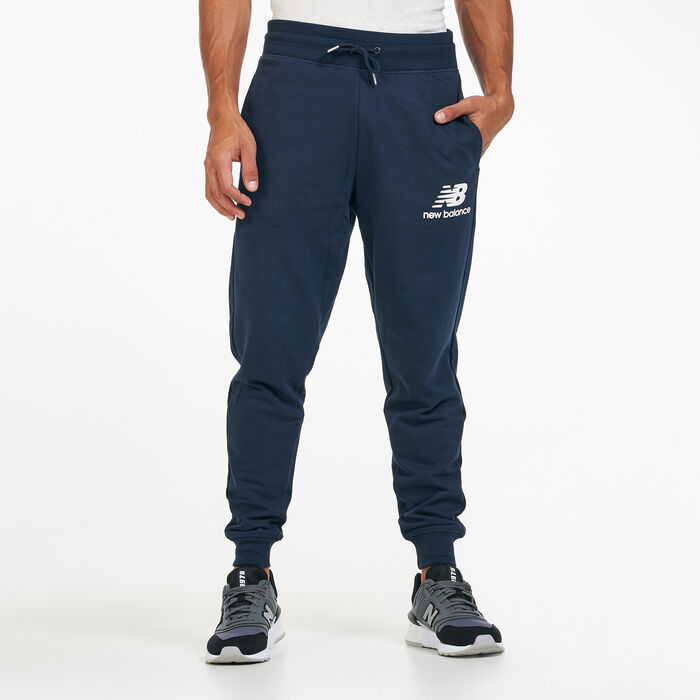 Buy New Balance Men\'s Essentials Stacked Logo Sweatpants Blue in KSA -SSS