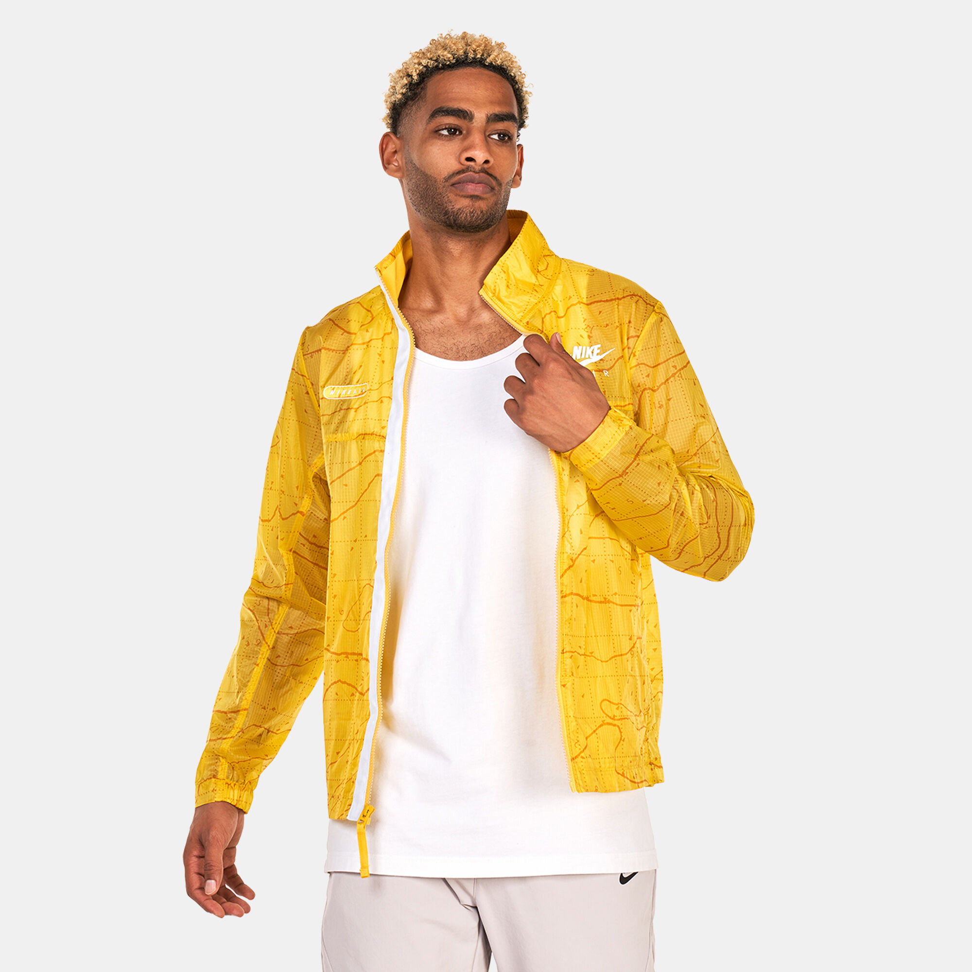 Nike yellow jacket mens sales