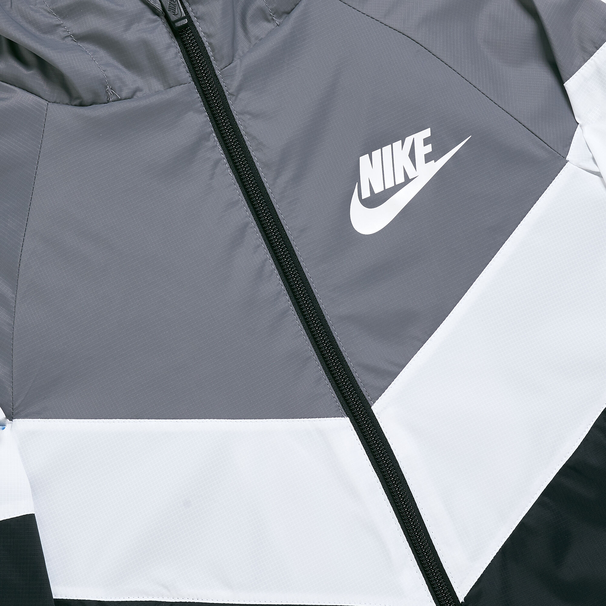 Buy Nike Kids Wind Runner Jacket Older Kids Grey in KSA SSS