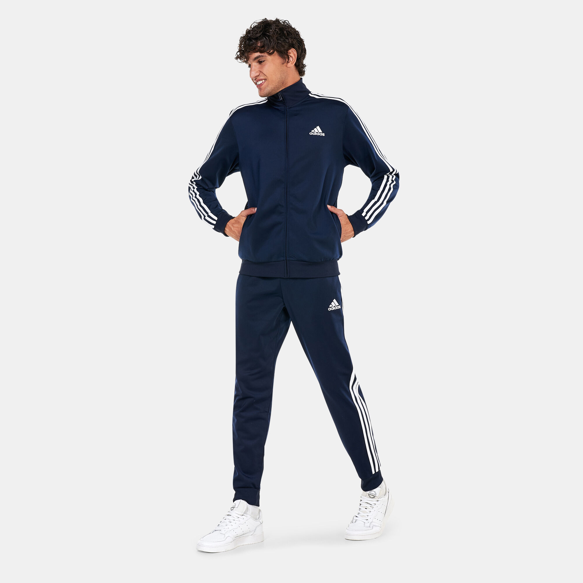 Adidas essentials discount navy tracksuit