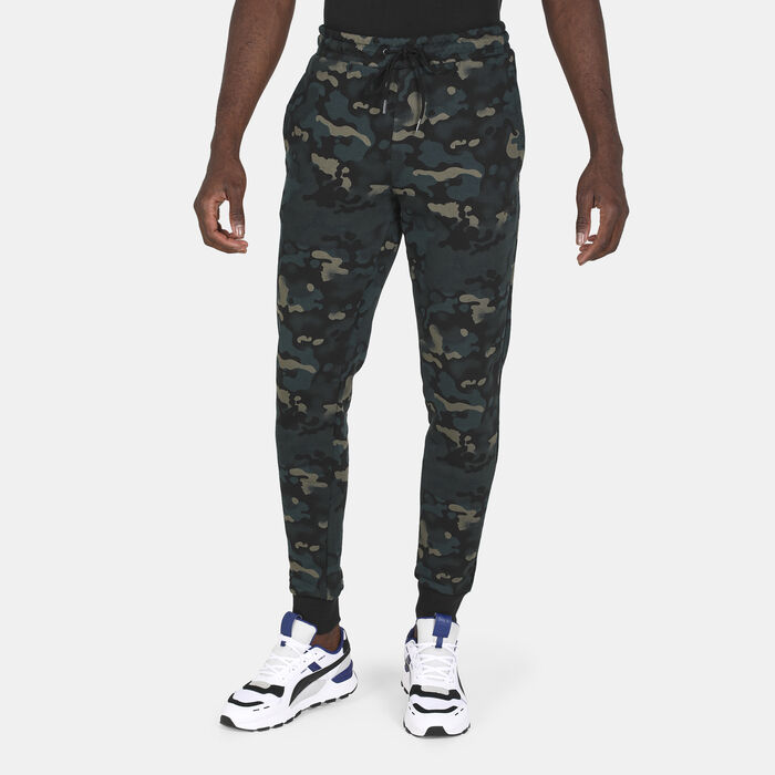 PUMA Men's Classics Camo Allover Print Pants Green PUMA Men's Classics Camo Allover Print Pants Green image number 0