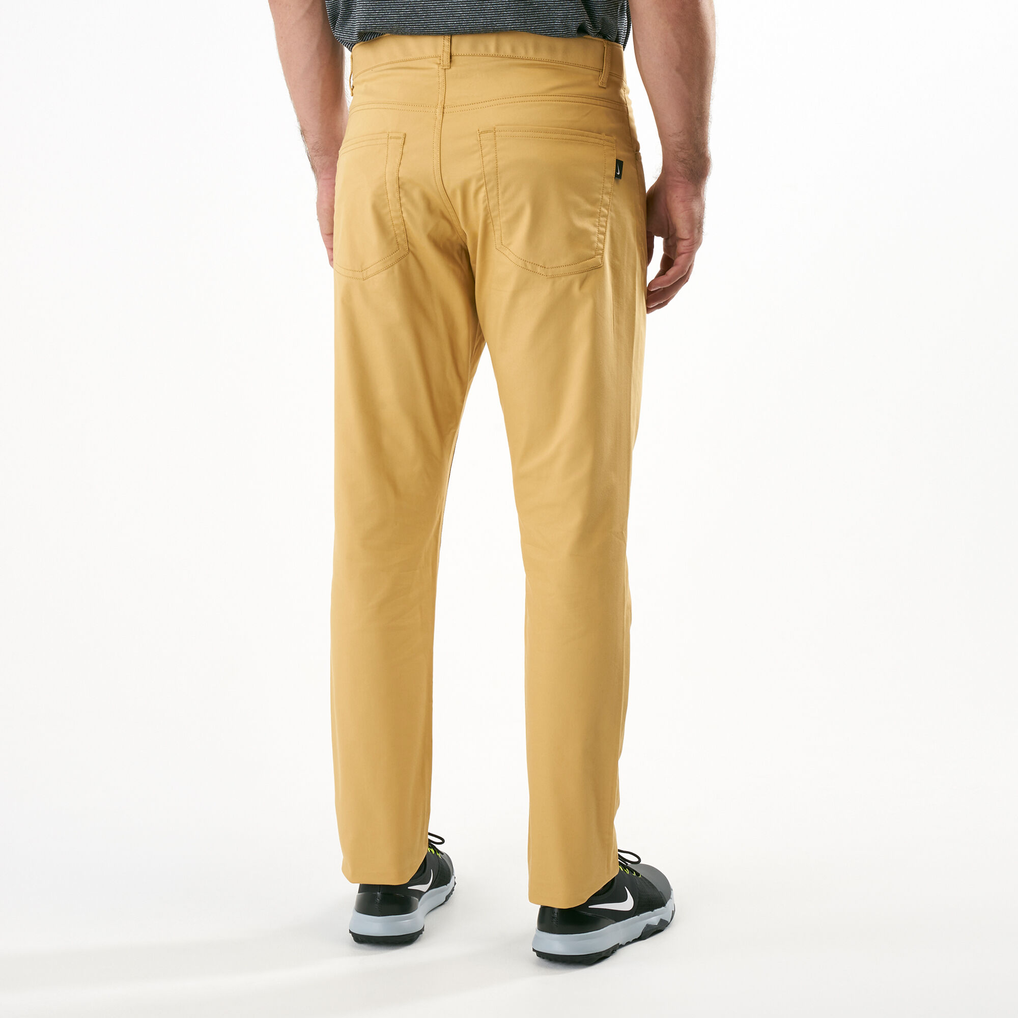 Nike gold golf pants store