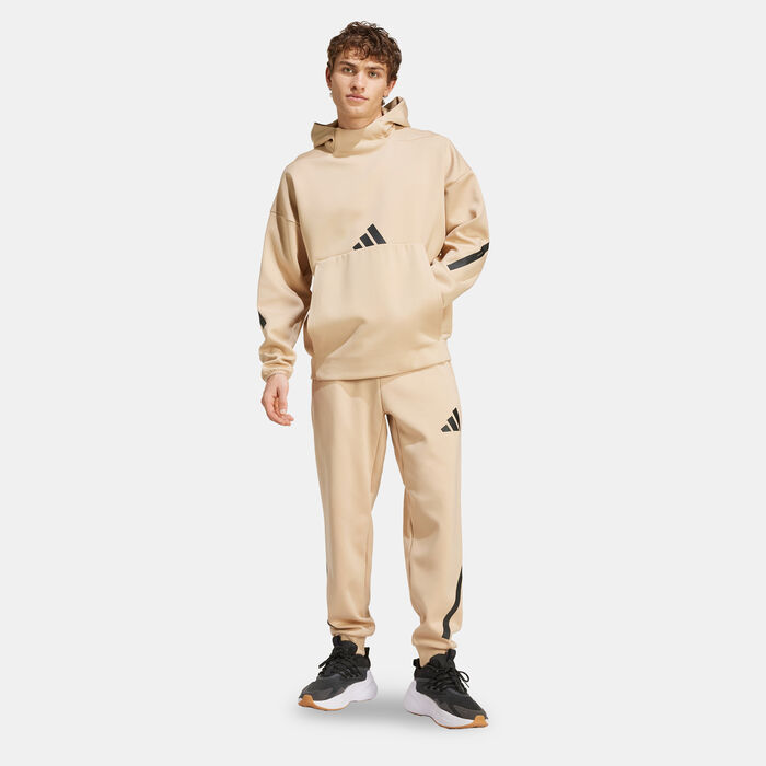 adidas Men's Z.N.E. Track Pants Beige image number 1