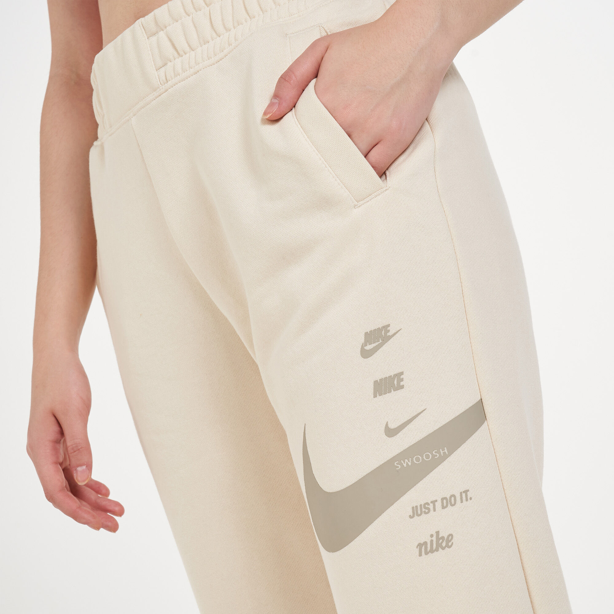 Buy Nike Women s Sportswear Swoosh Sweatpants Beige in KSA SSS