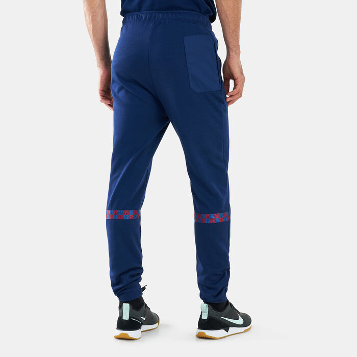 Nike Men's F.C. Barcelona Dri-FIT Travel Fleece Sweatpants Blue Nike Men's F.C. Barcelona Dri-FIT Travel Fleece Sweatpants Blue image number 1