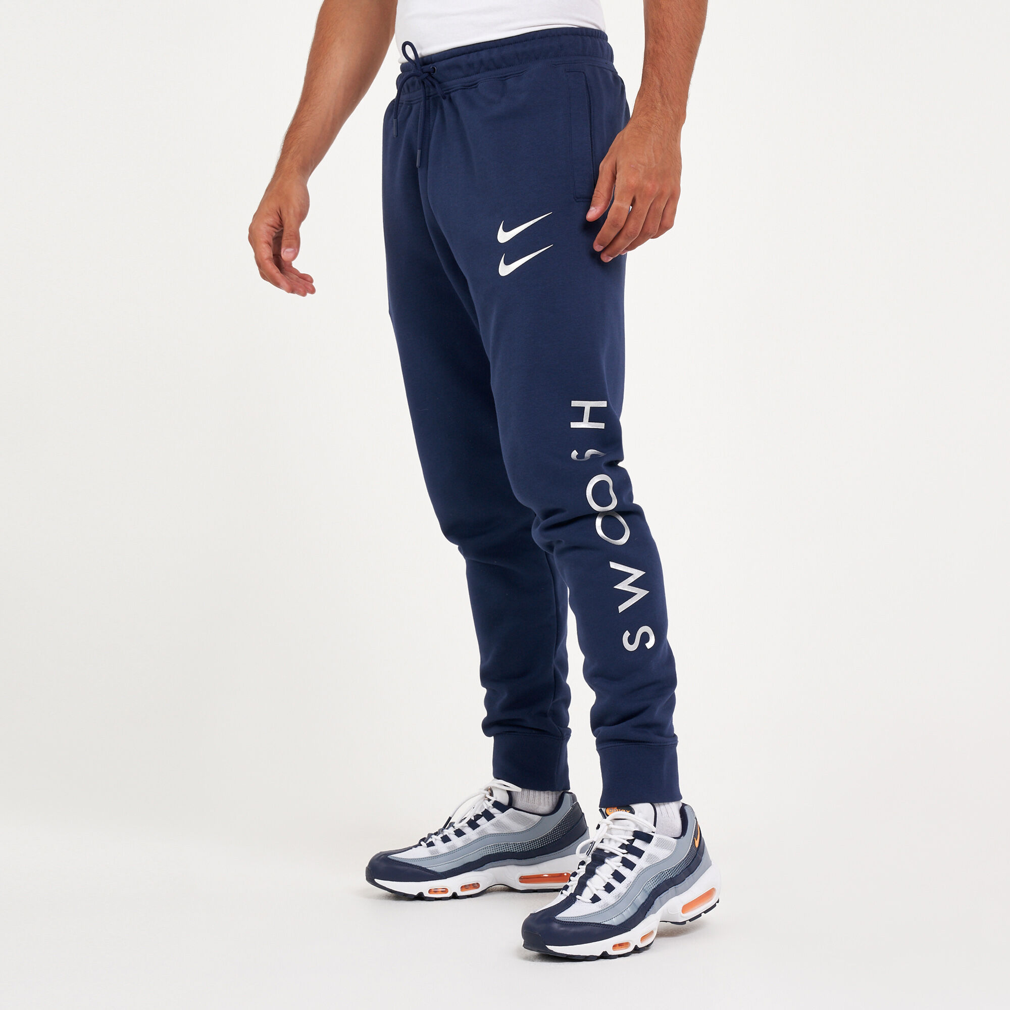 mens swoosh pants
