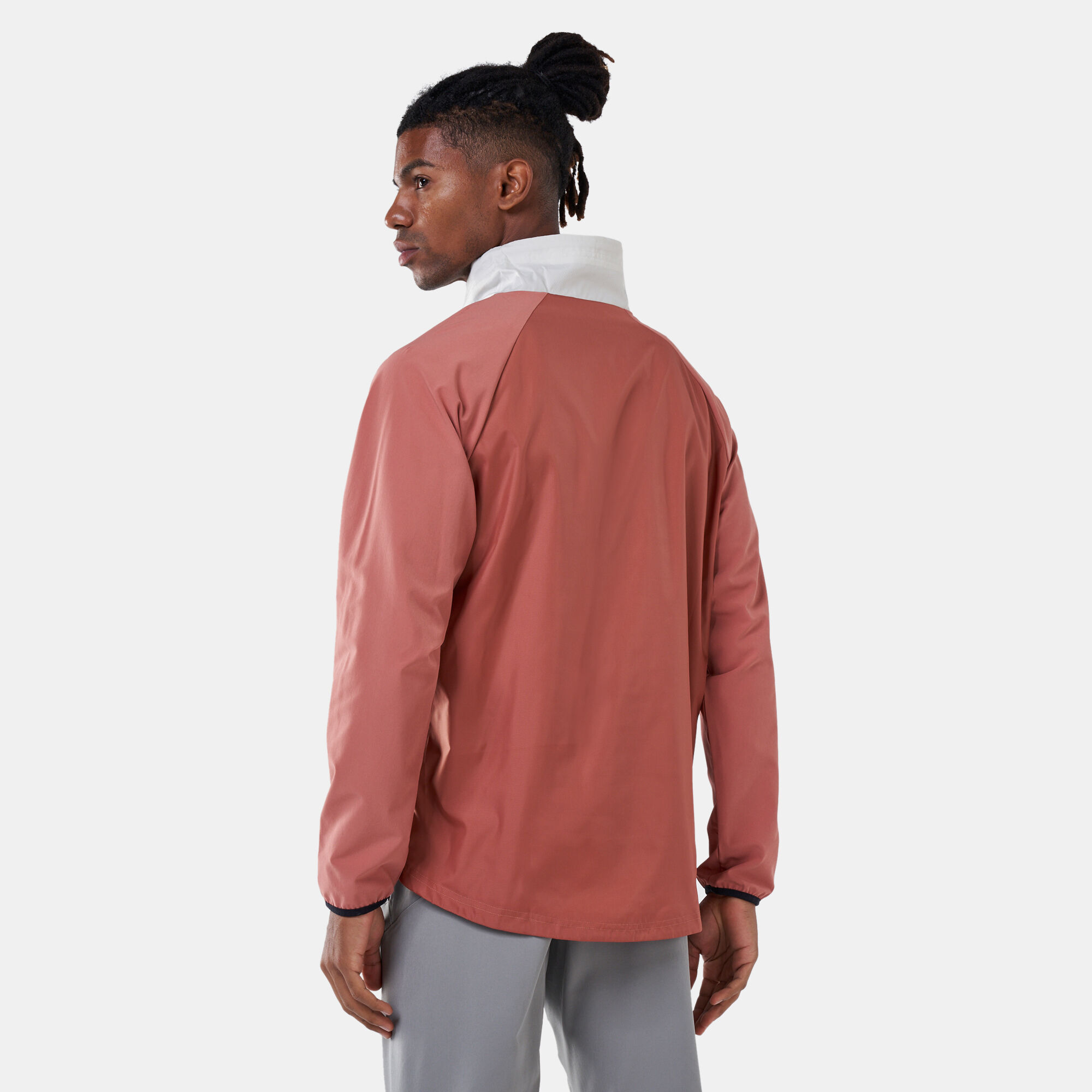 Buy Under Armour Men s Stretch Woven 1 2 Zip Jacket Brown in KSA SSS