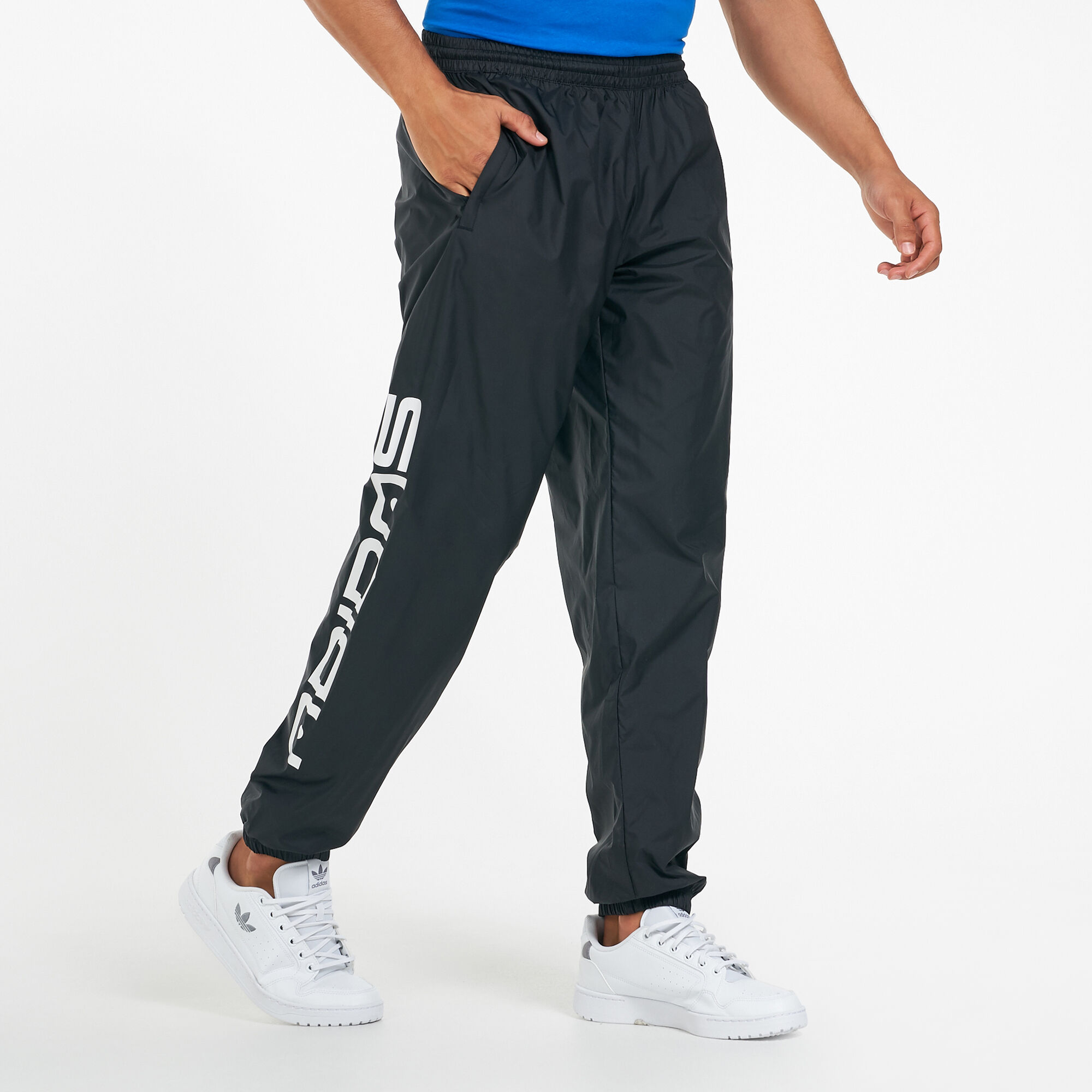 Graphic track pants sales