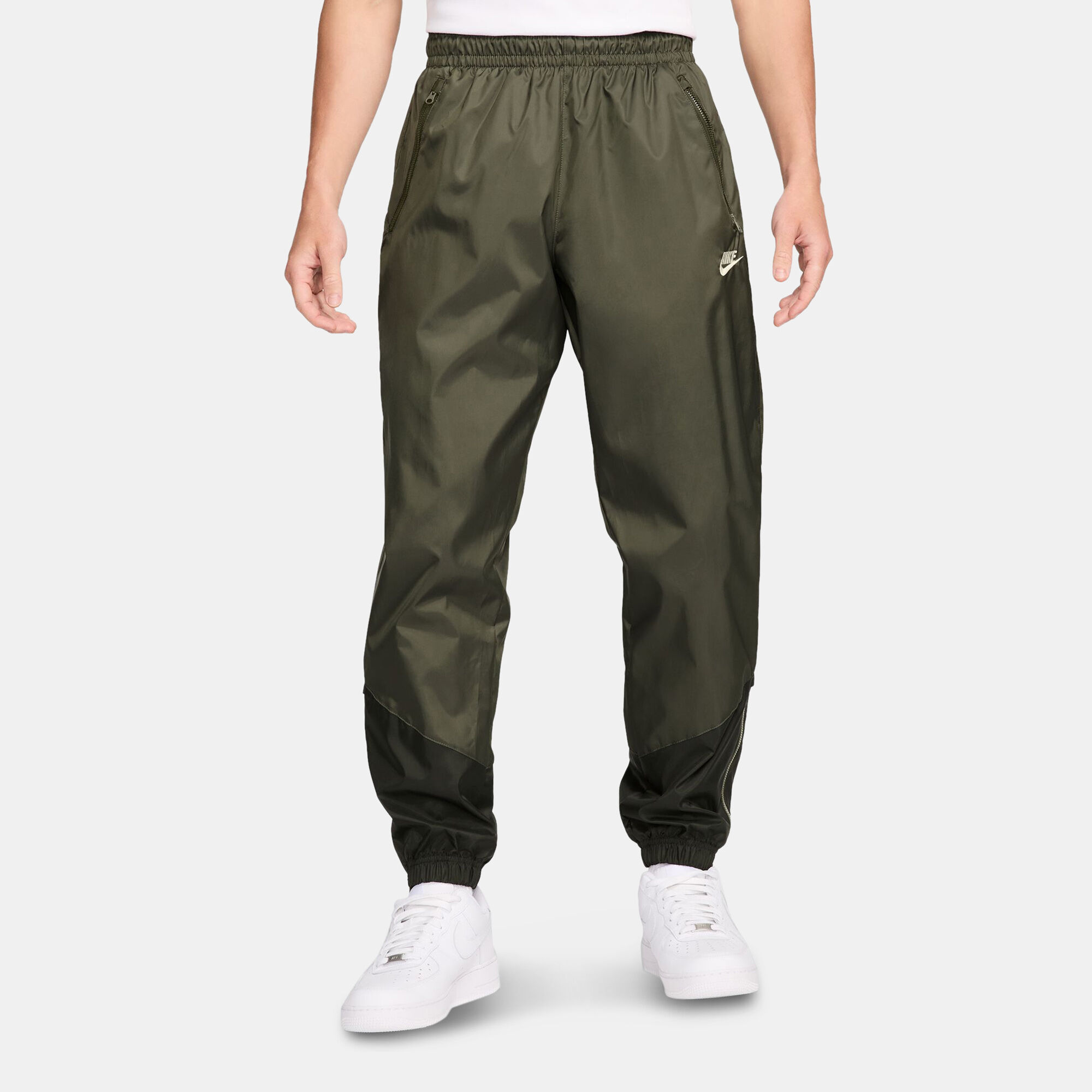 Nike Men's Windrunner Woven Lined Pants Brown in KSA -SSS