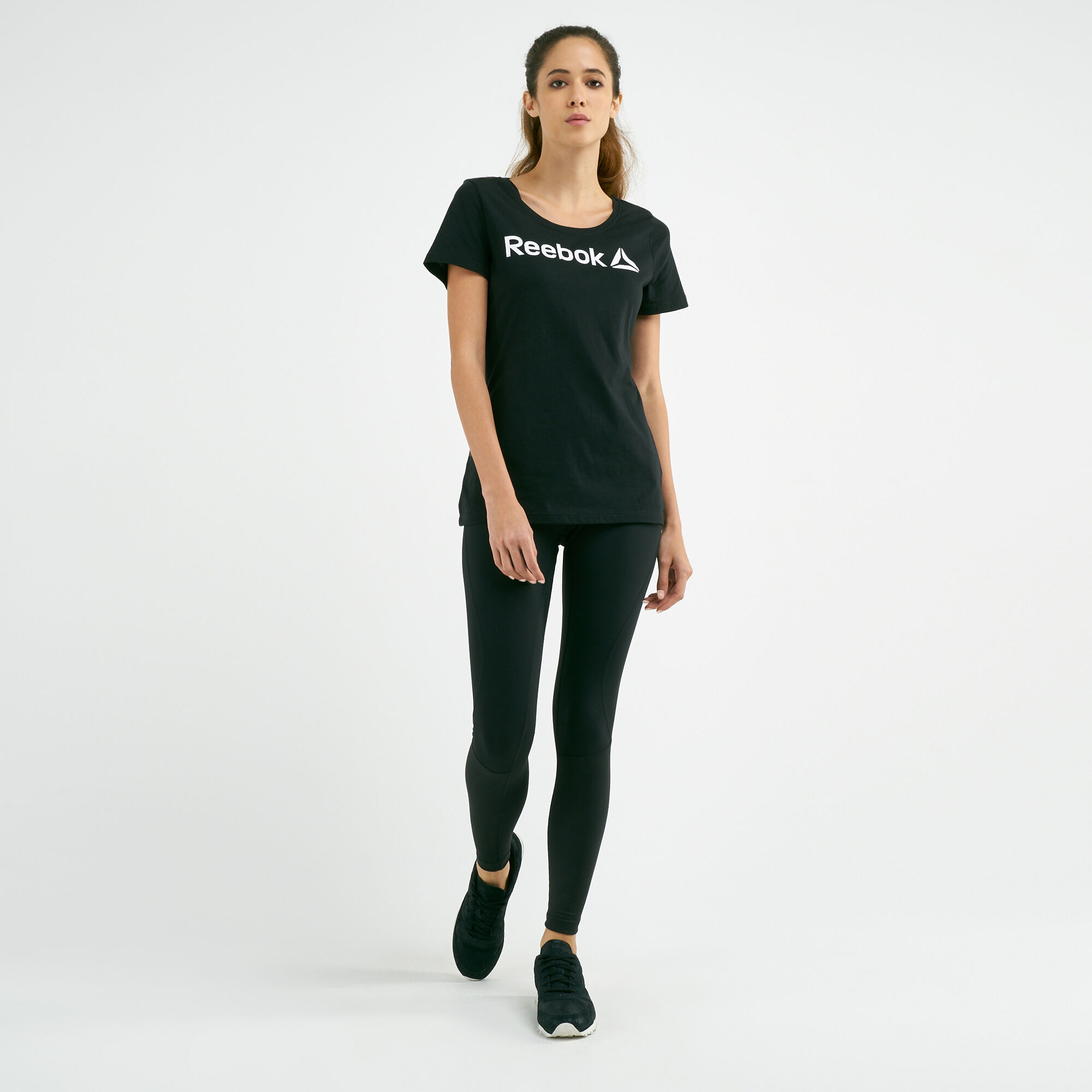 Buy Reebok Women s Linear Scoop Neck T Shirt Black in KSA SSS