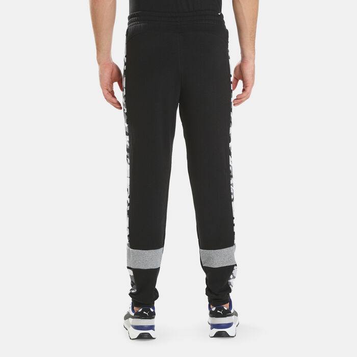 PUMA Men's Essentials+ Camo Sweatpants Black PUMA Men's Essentials+ Camo Sweatpants Black image number 1