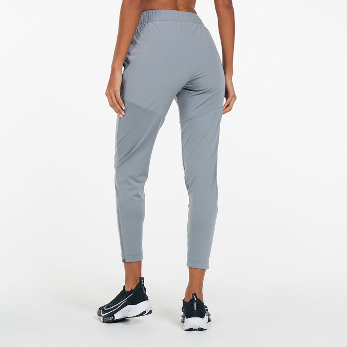 Buy Nike Women's Essential Running Pants Grey in KSA -SSS