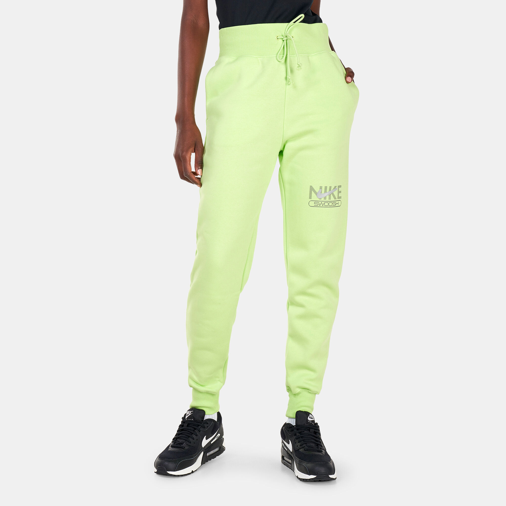 Nike women's sportswear hotsell neon swoosh fleece pants