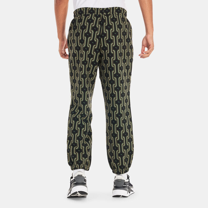 PUMA Men's Classics 70s Printed Fleece Joggers Black PUMA Men's Classics 70s Printed Fleece Joggers Black image number 1