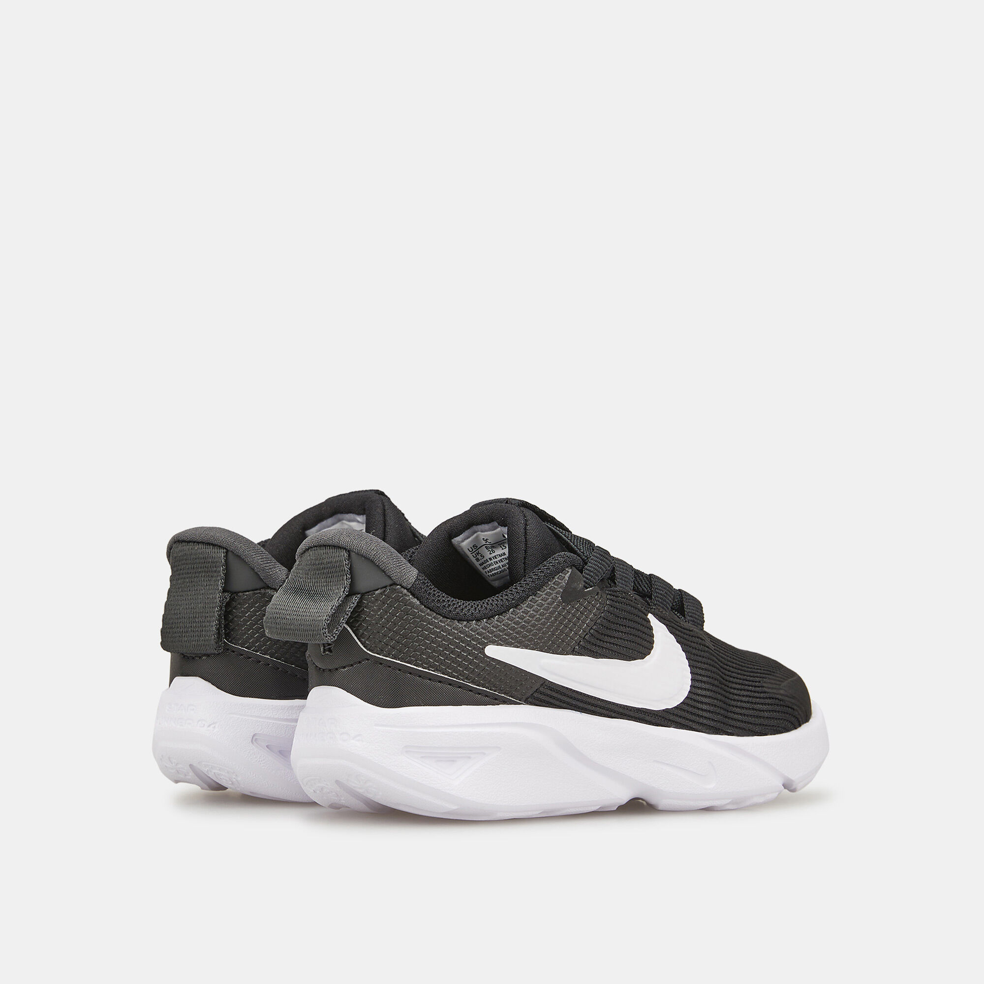 Nike tanjun racer outlet grade school boys' sneakers