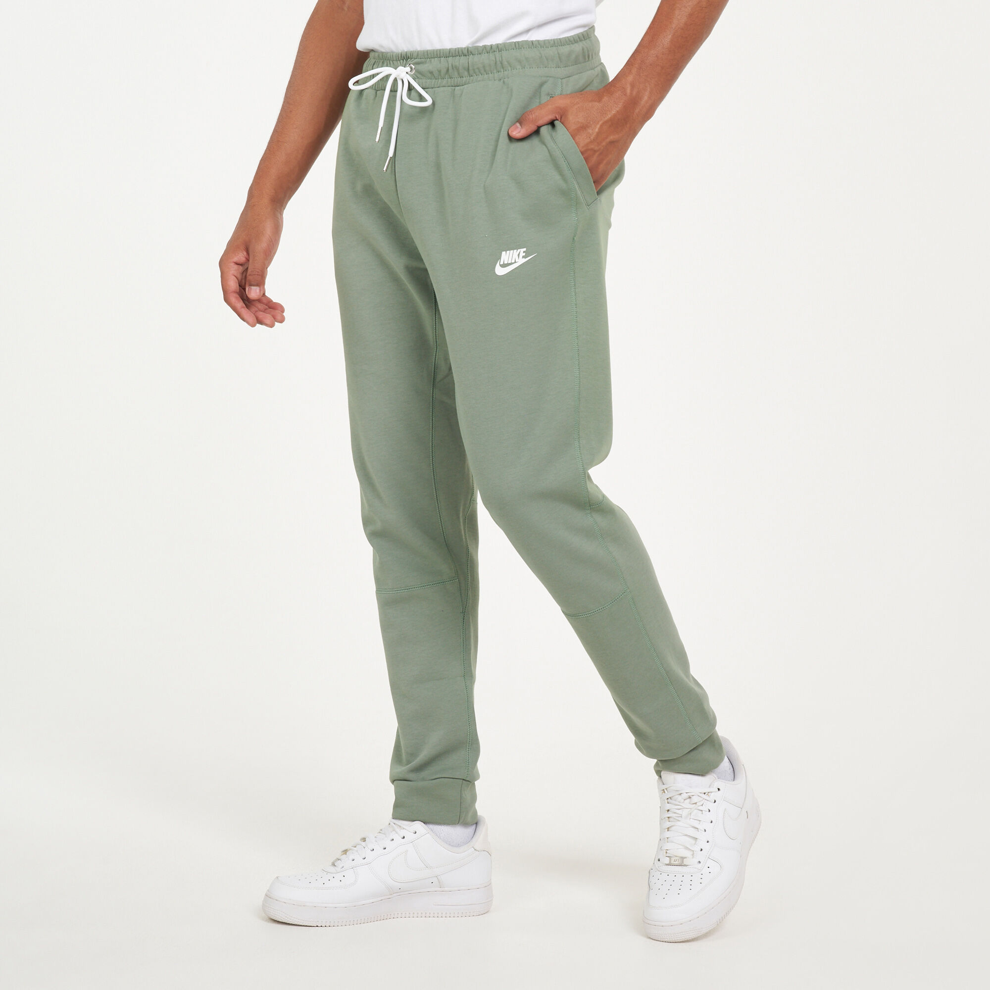 Nike modern fleece pants green sales