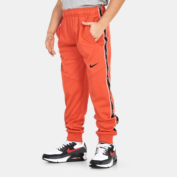 Nike Kids' Sportwear Repeat Graphic Joggers Red Nike Kids' Sportwear Repeat Graphic Joggers Red image number 0