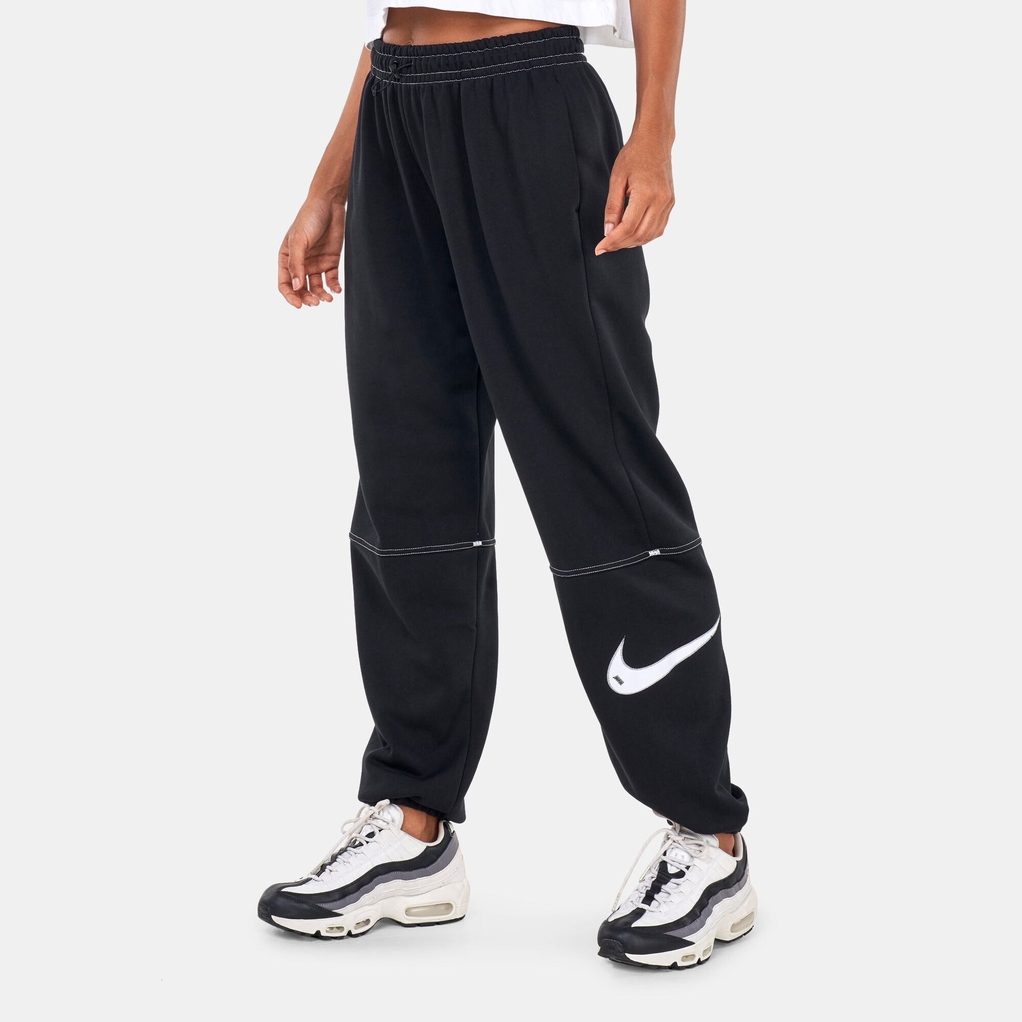 Nike sb swoosh black track 2025 pants