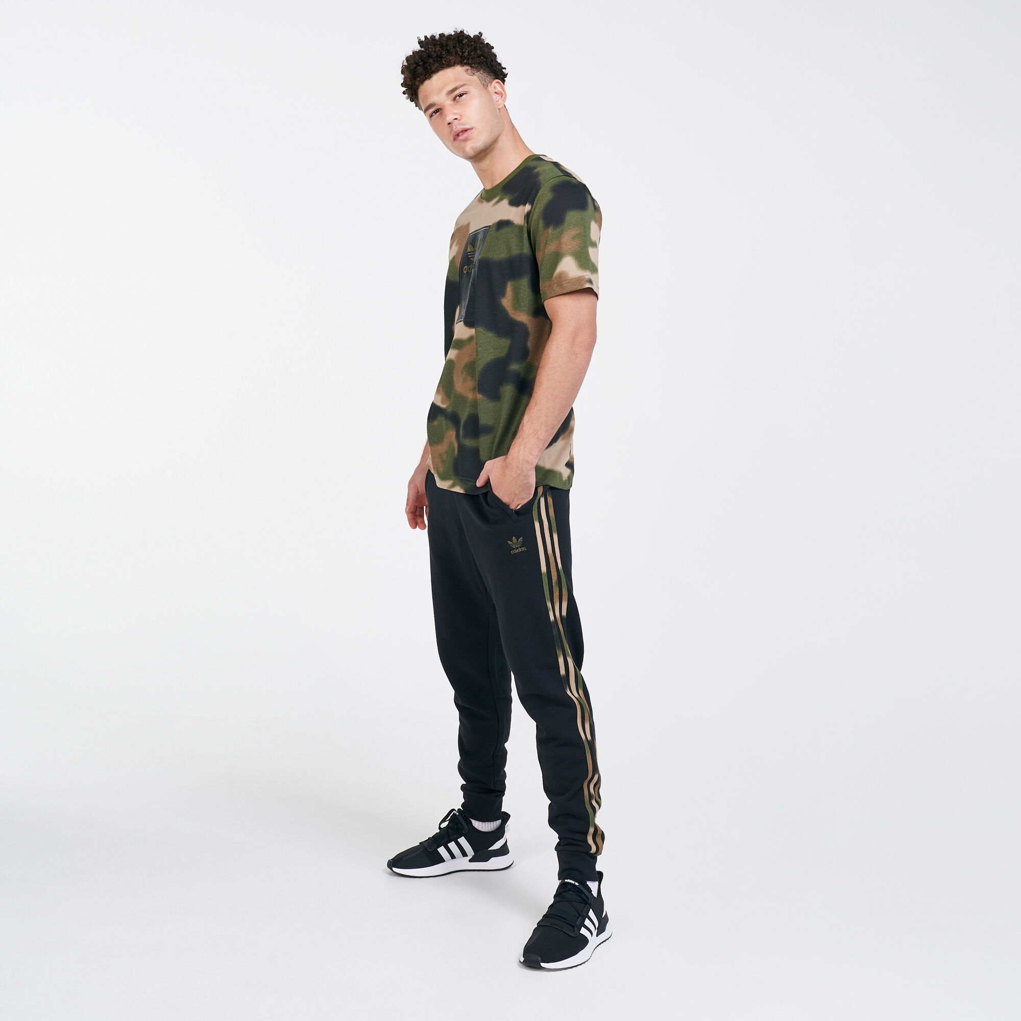 Adidas camo stripe pants sales