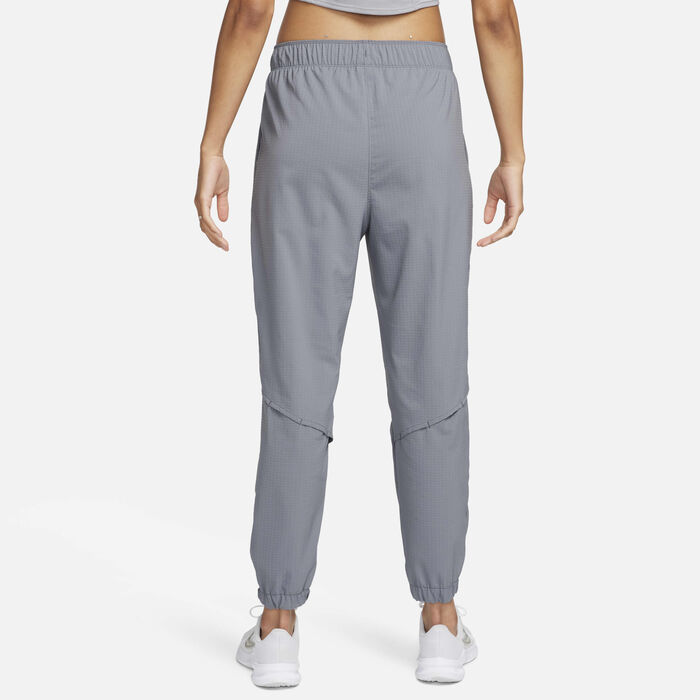 Nike Women's Dri-FIT Fast Mid-Rise Warm-Up Running Trousers Grey Nike Women's Dri-FIT Fast Mid-Rise Warm-Up Running Trousers Grey image number 1