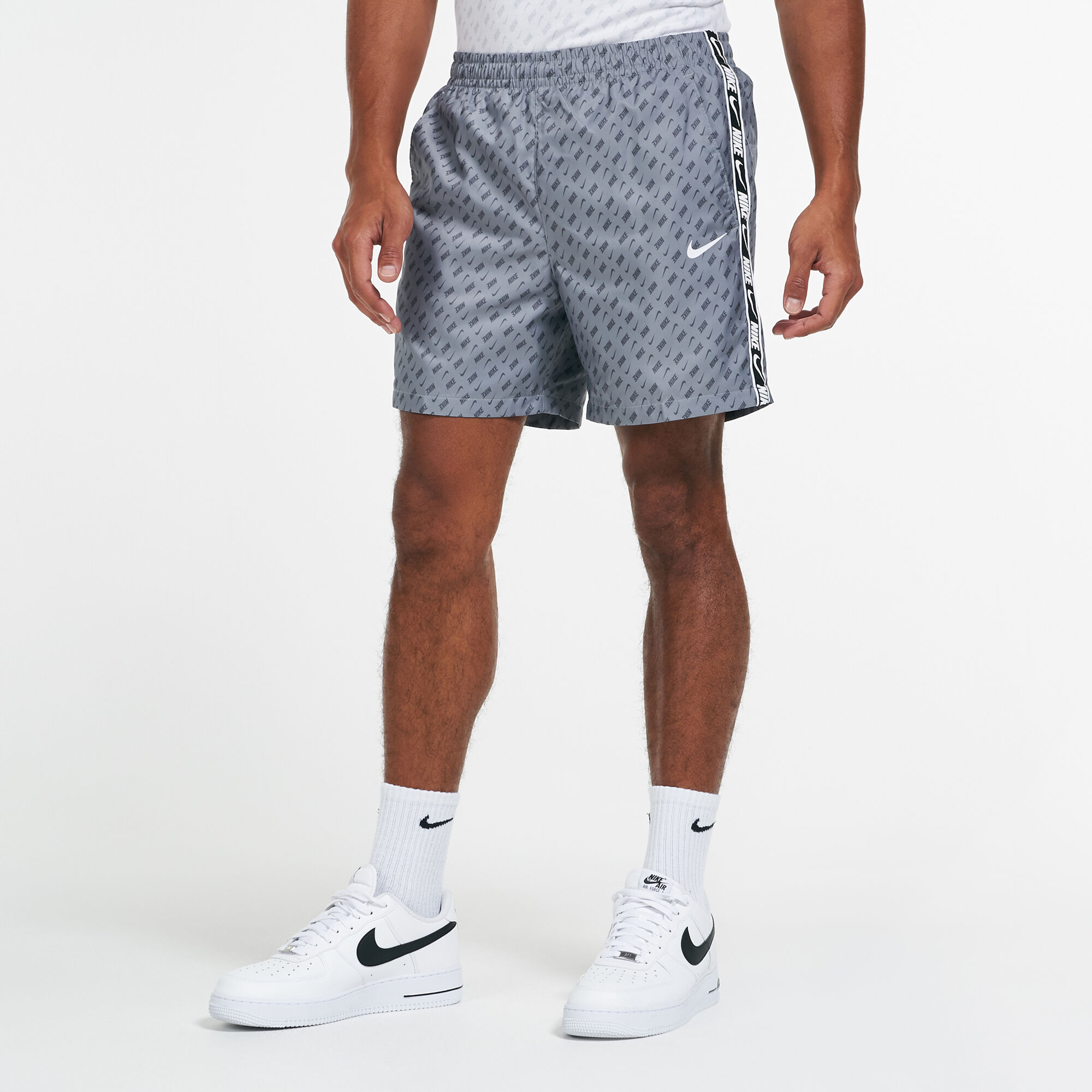 Buy Nike Men s Sportswear Repeat Woven Shorts Grey in KSA SSS