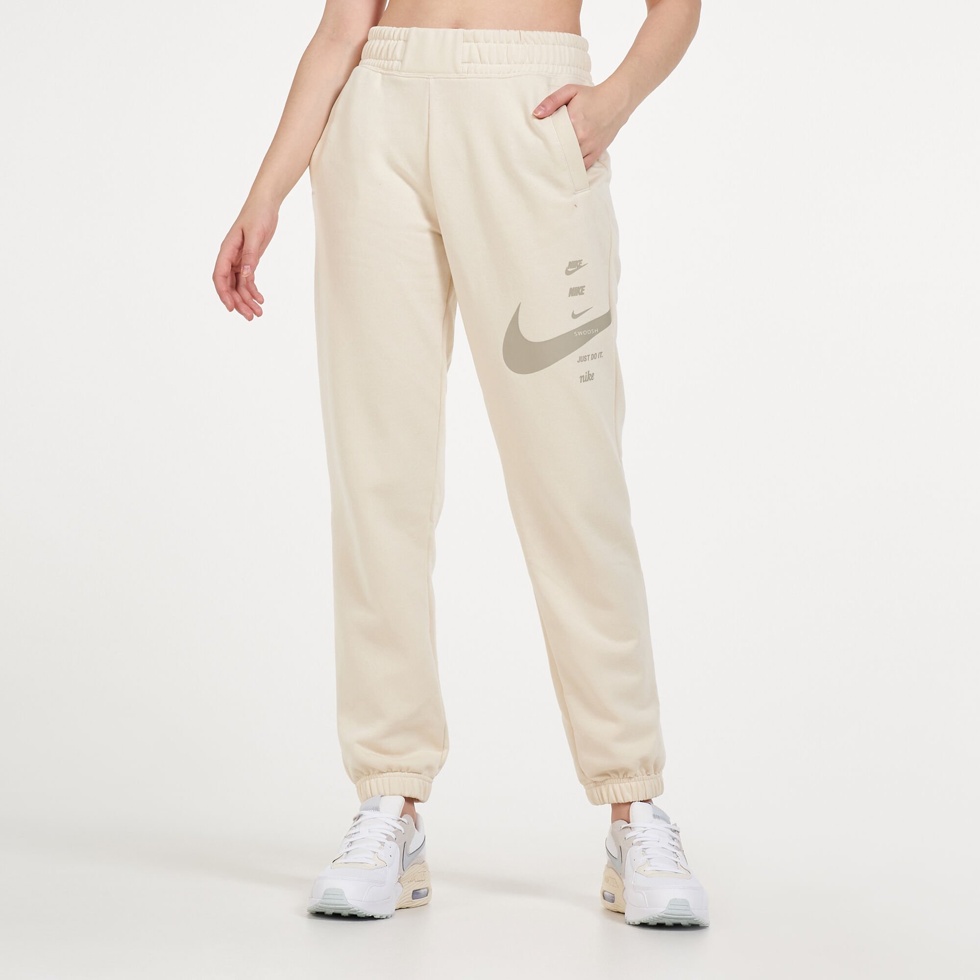 Buy Nike Women s Sportswear Swoosh Sweatpants Beige in KSA SSS