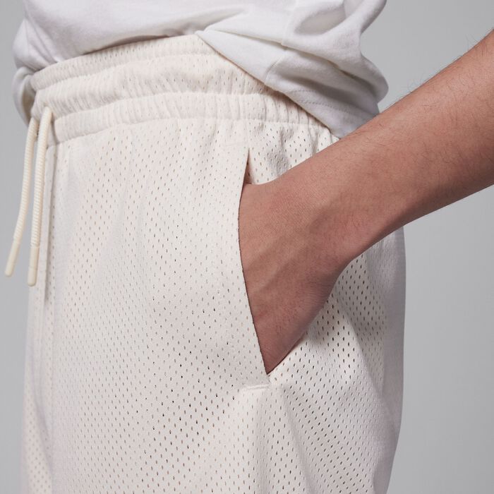 Jordan Kids' MJ Essentials Baseline Dri-FIT Shorts Ivory image number 3