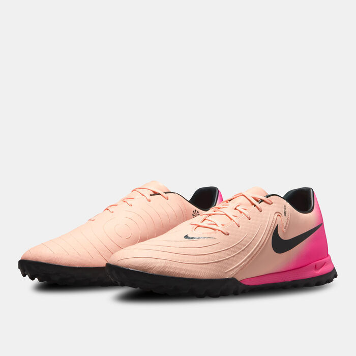 Nike Men's Phantom GX 2 Academy Turf Ground Football Shoes Peach Nike Men's Phantom GX 2 Academy Turf Ground Football Shoes Peach image number 1