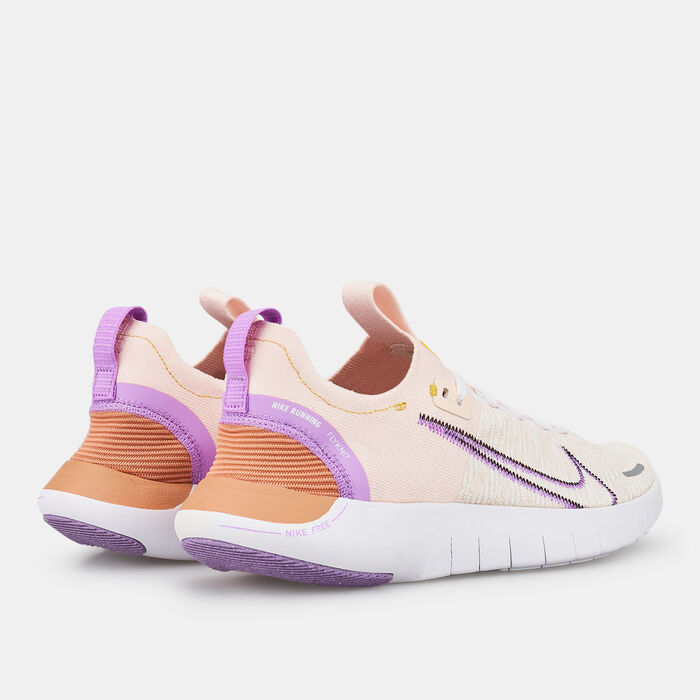 Nike Women's Free RN NN Road Running Shoes Pink image number 2