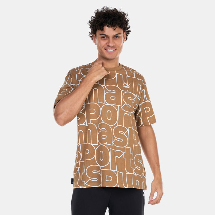 PUMA Men's TEAM Allover Print T-Shirt Beige PUMA Men's TEAM Allover Print T-Shirt Beige image number 0