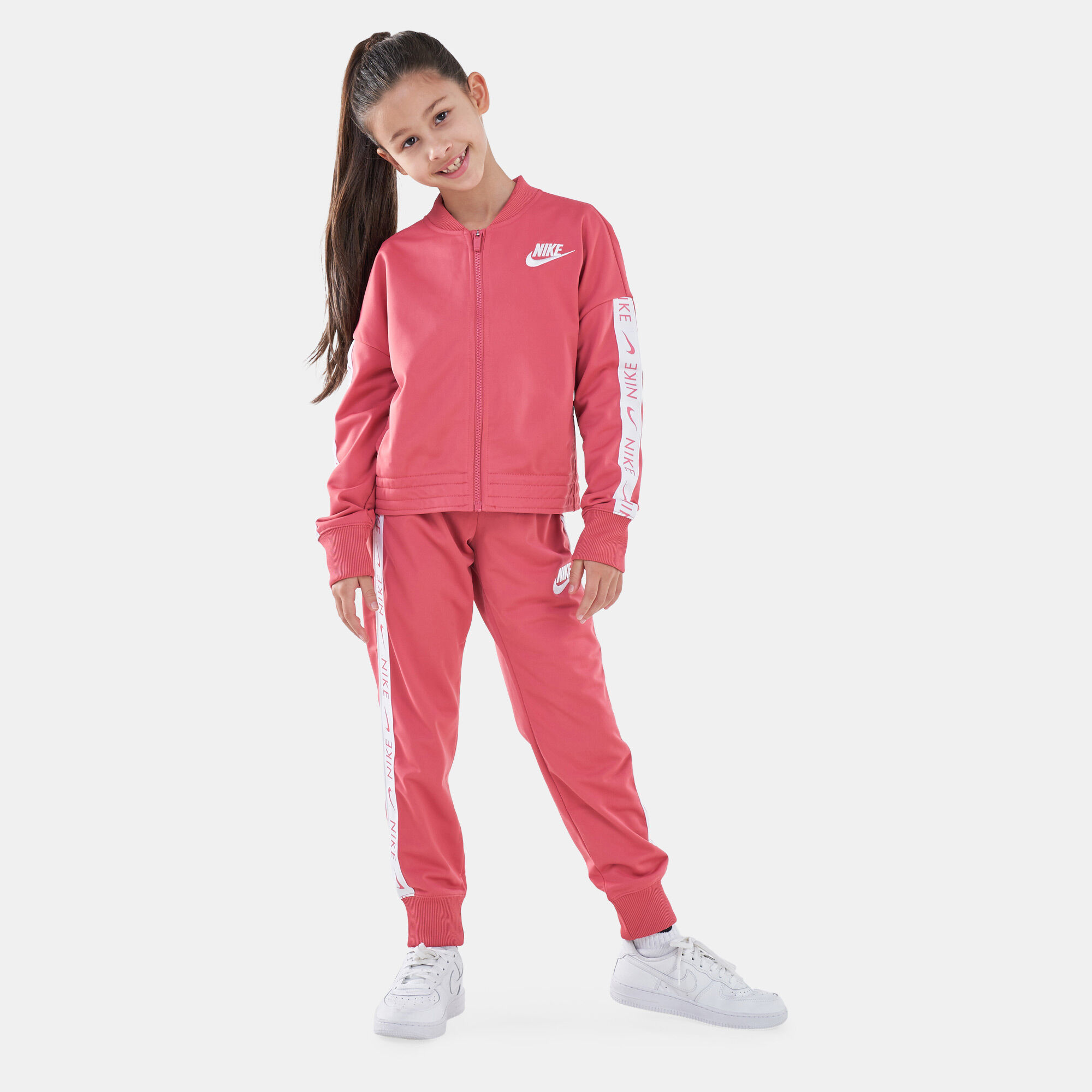 Pink nike outlet tracksuit kids