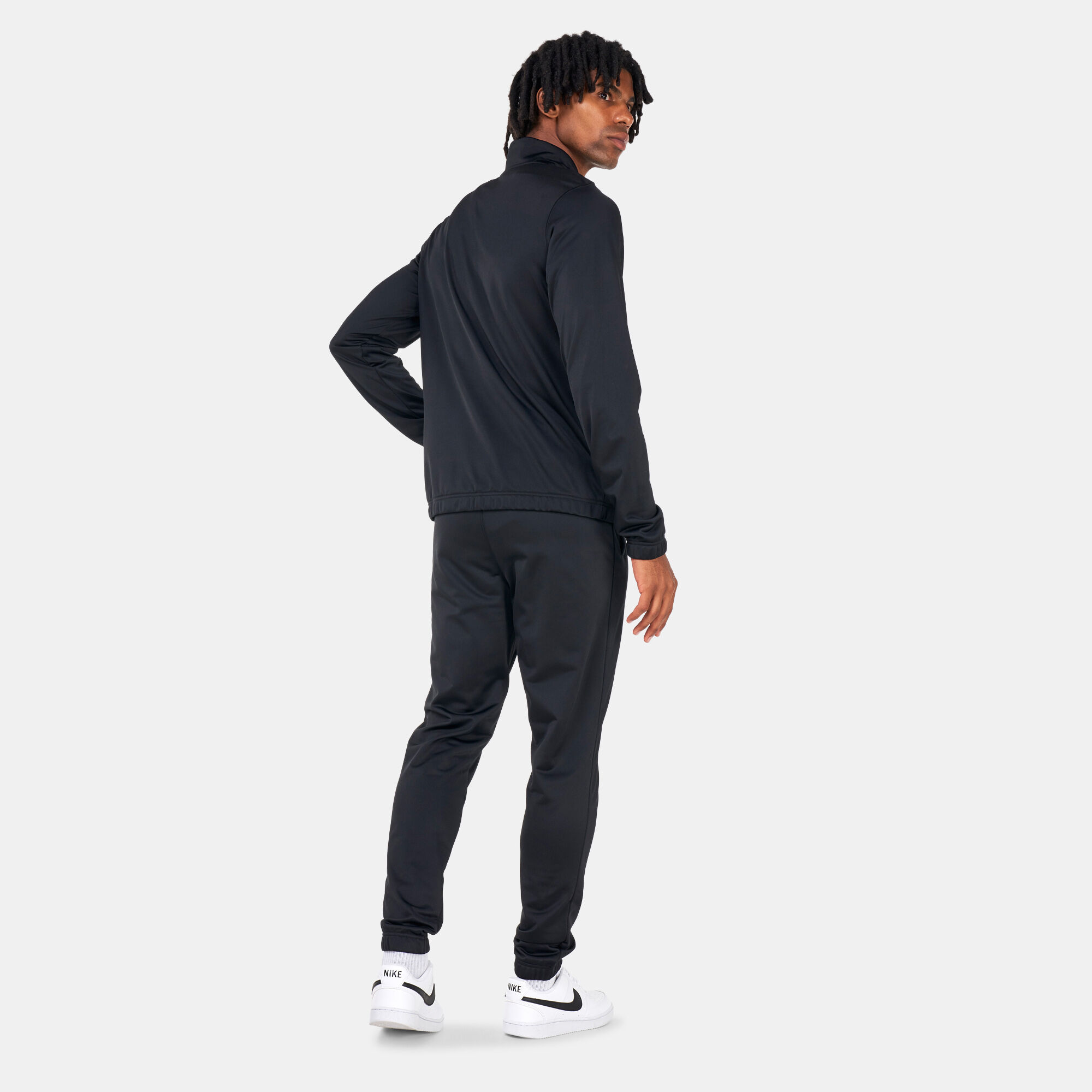 Buy Nike Men s Sportswear Sport Essentials Tracksuit Black in KSA SSS
