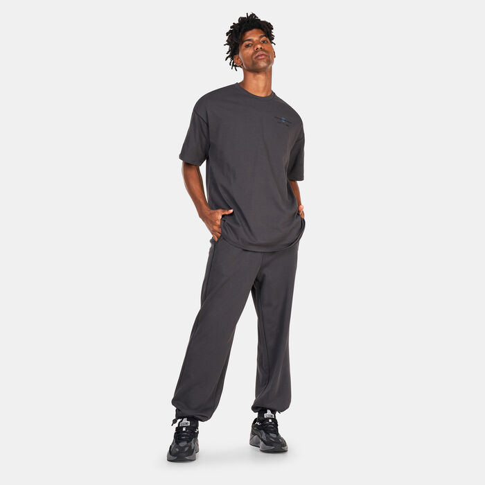 PUMA Men's Classics RE:ESCAPE Sweatpants Grey PUMA Men's Classics RE:ESCAPE Sweatpants Grey image number 2