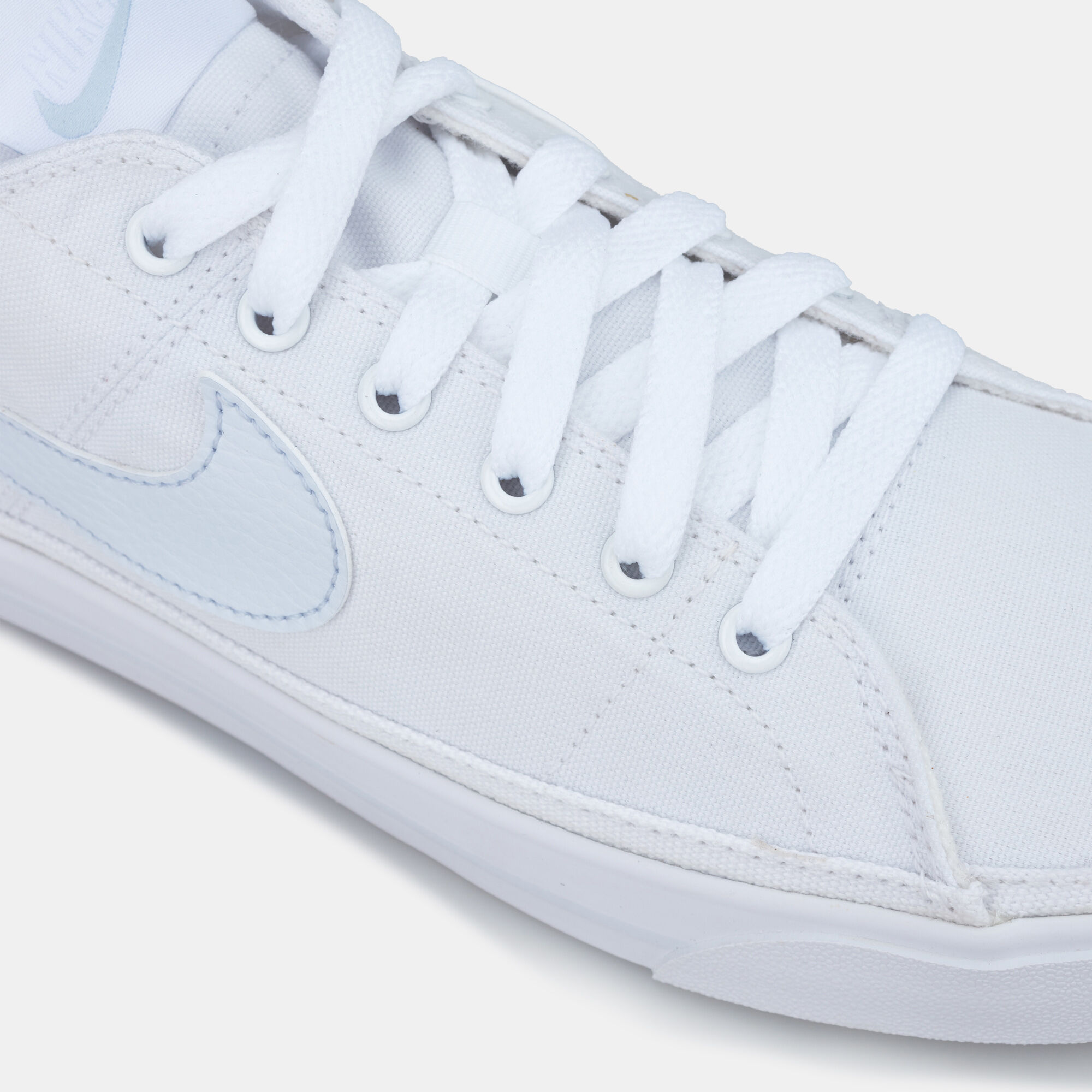Nike primo court canvas white best sale