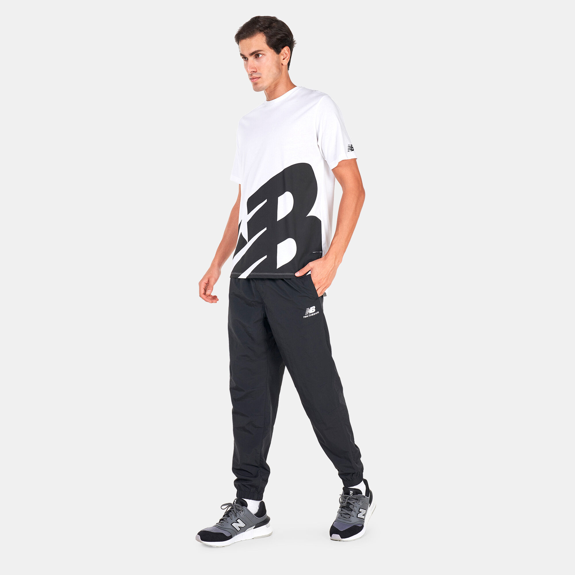 Men s Athletics Higher Learning Wind Pants Black New Balance in KSA SSS
