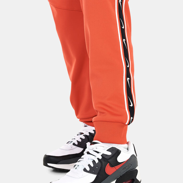 Nike Kids' Sportwear Repeat Graphic Joggers Red Nike Kids' Sportwear Repeat Graphic Joggers Red image number 3