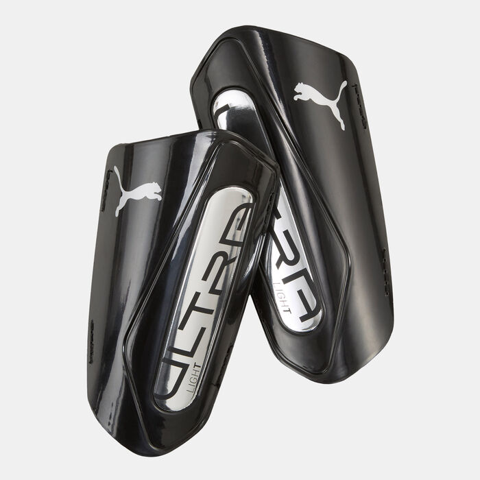 PUMA Kids' ULTRA Light Football Strap Shinguards Black image number 0