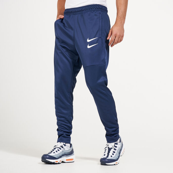 Buy Nike Men's Sportswear MTL Swoosh Track Pants in Saudi |