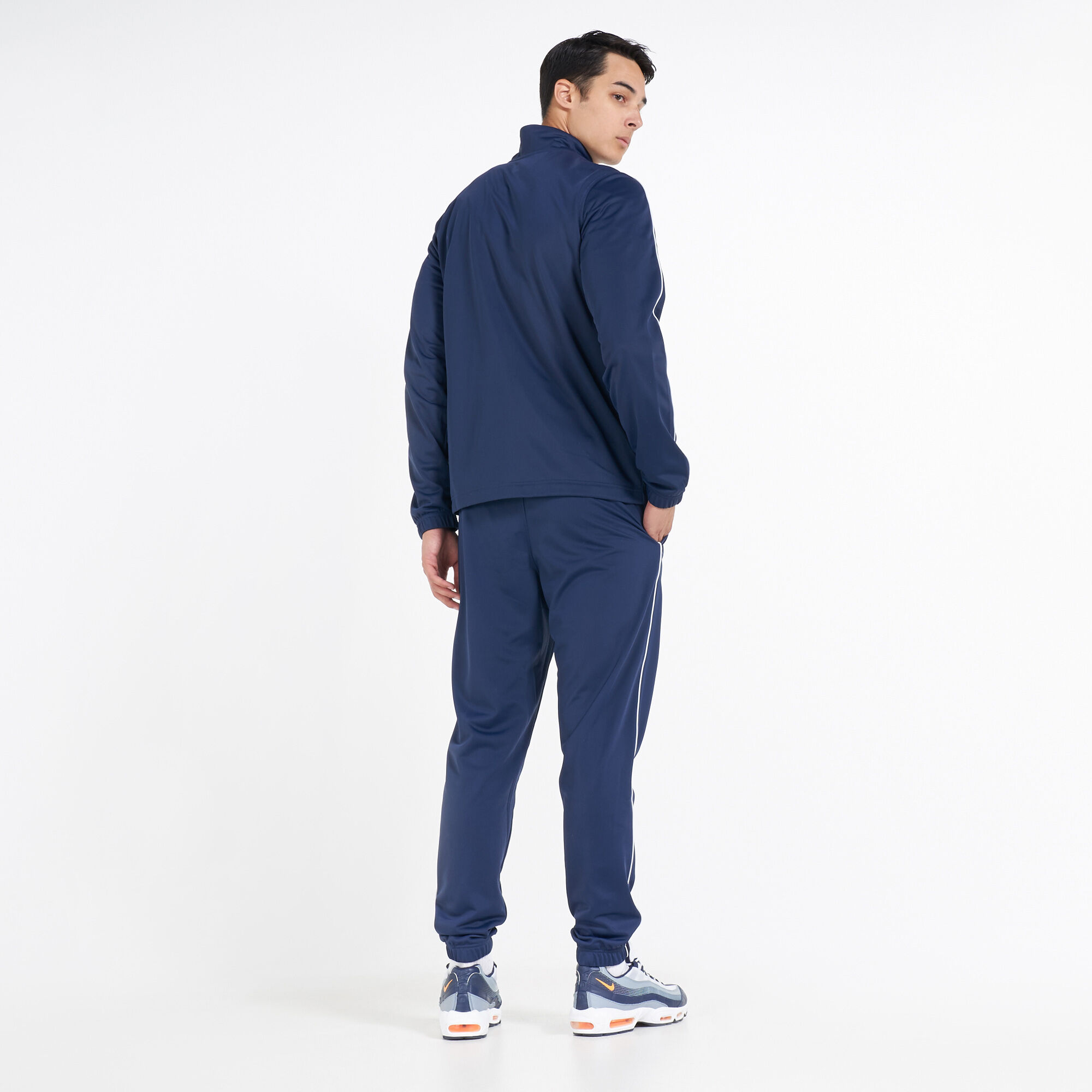 Buy Nike Men s CE Sportswear Basic Tracksuit Blue in KSA SSS