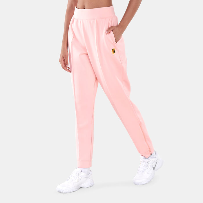 Nike Women's Dri-FIT Court Tennis Pants Peach image number 0