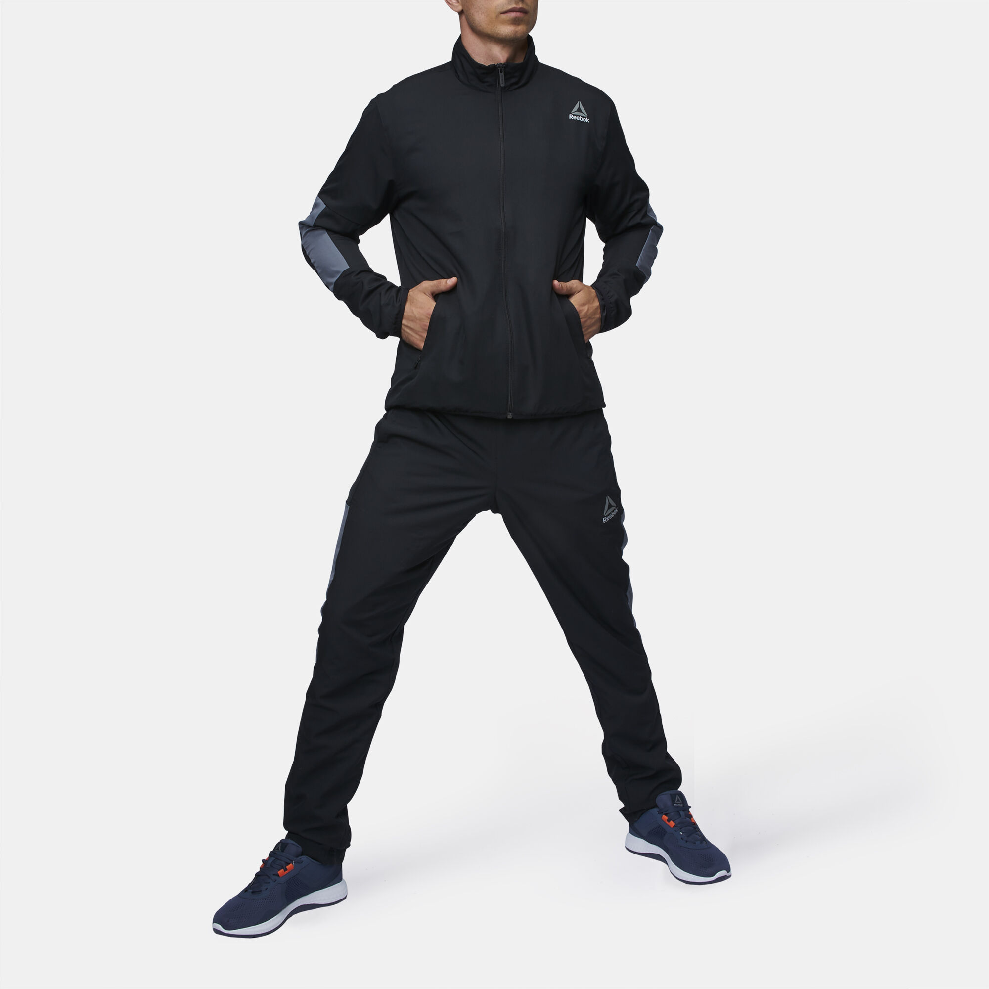 Reebok discount woven tracksuit
